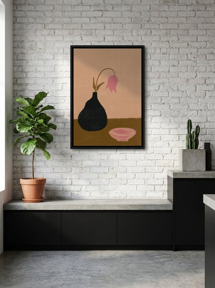 Canvas wall art with a black surround styled on the wall in an industrial loft kitchen
