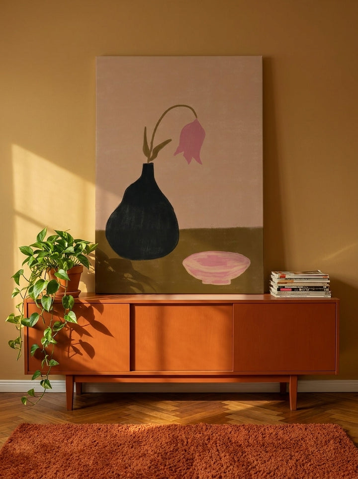 Stretched canvas wall art standing on a sideboard in a retro 70s dining room