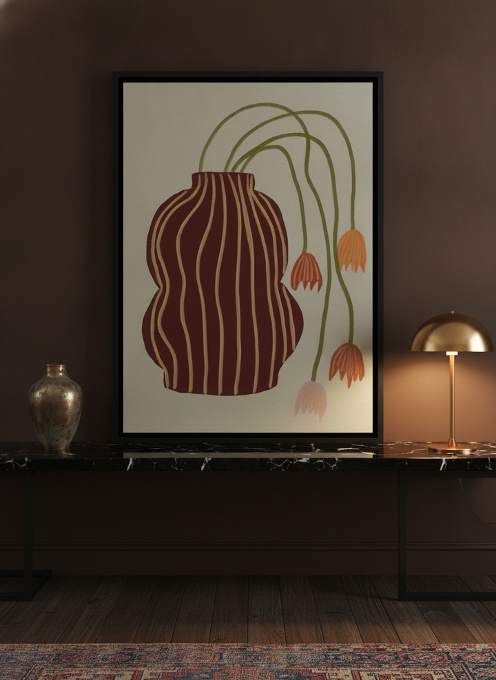 Canvas wall art with a black surround standing on a kitchen bench in a moody kitchen