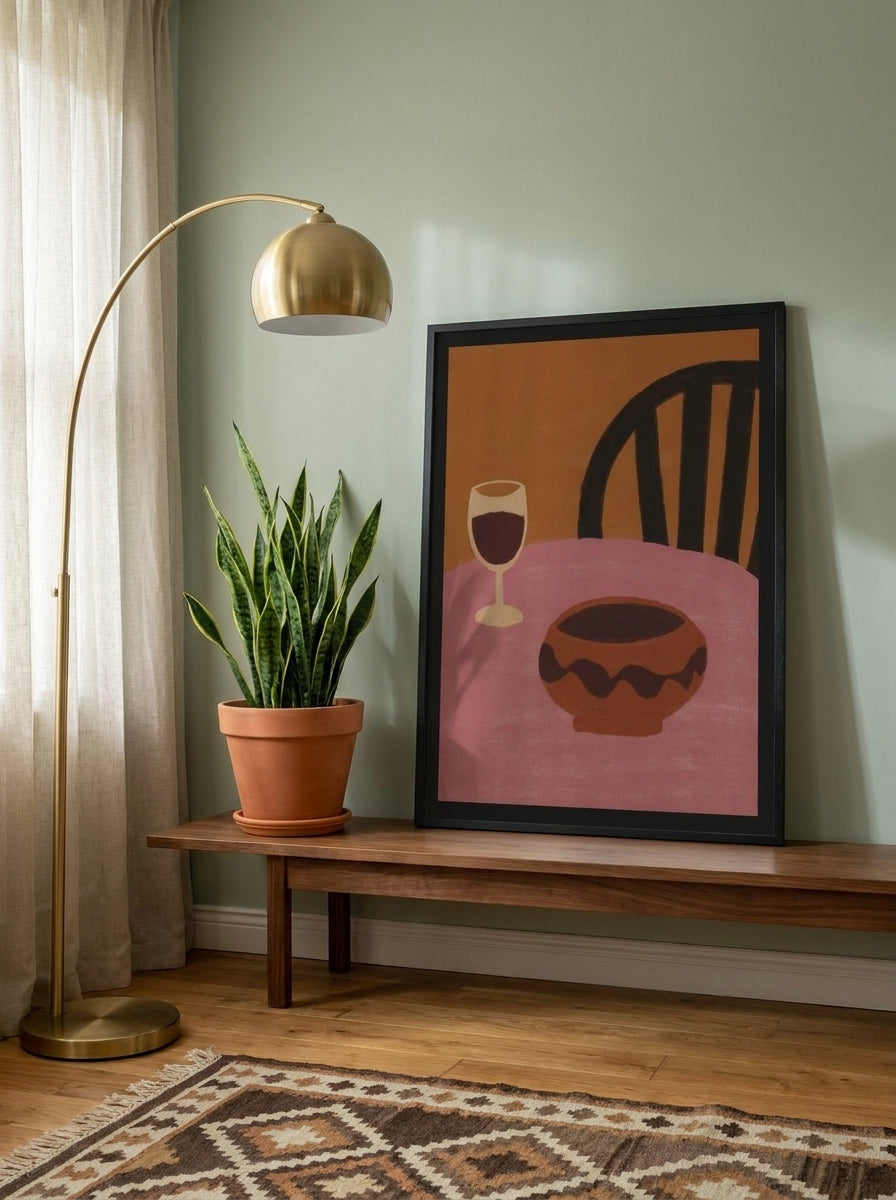 Modern wall art print standing on a kitchen bench in a mid-century kitchen
