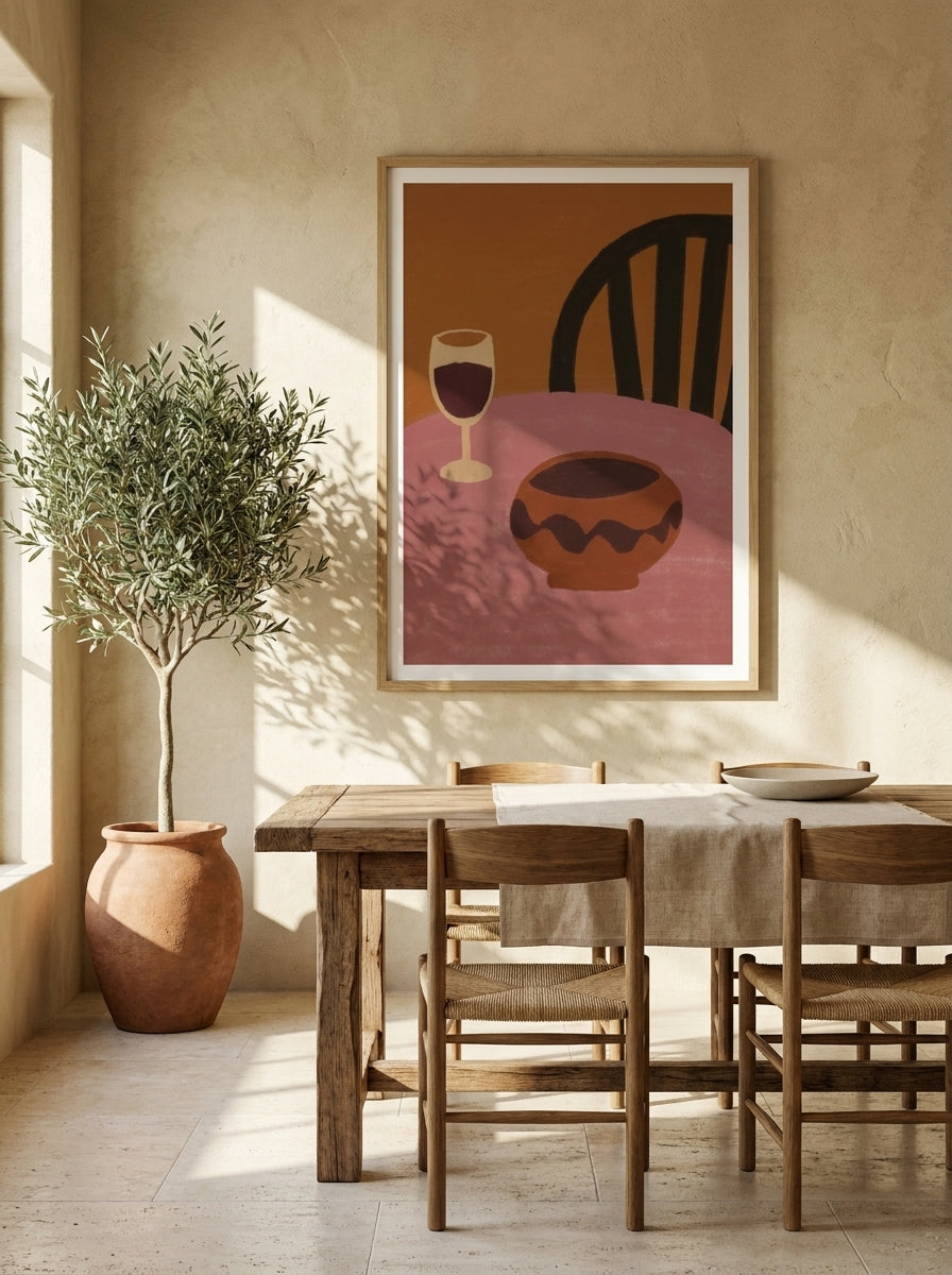 Modern wall art print styled on the wall in a Mediterranean dining room