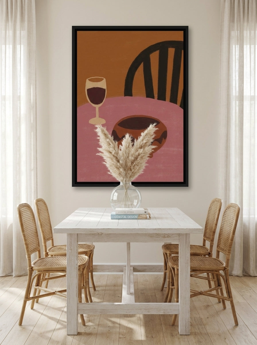 Oversized statement canvas wall art with a black surround styled on the wall in a coastal dining room