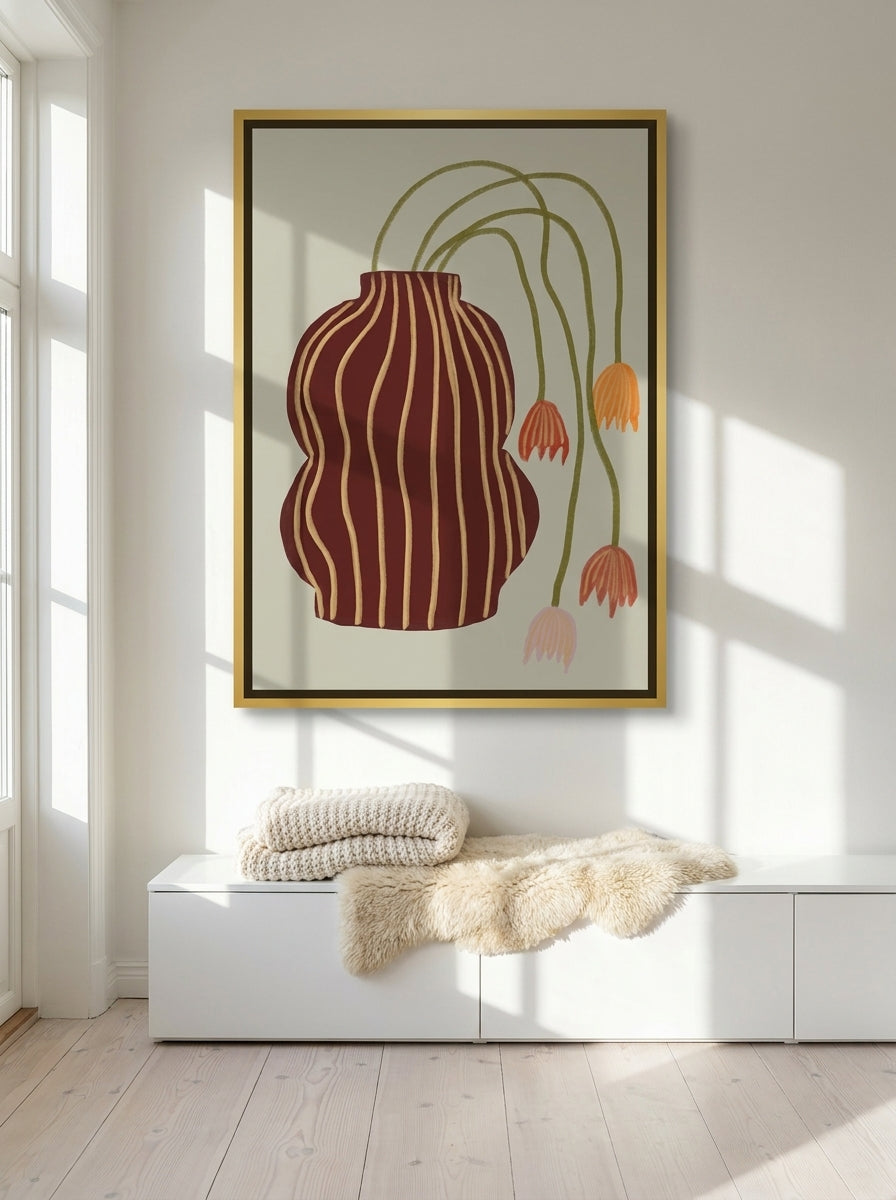 Oversized statement canvas wall art with a gold leaf surround styled on the wall in a bright Scandinavian living room