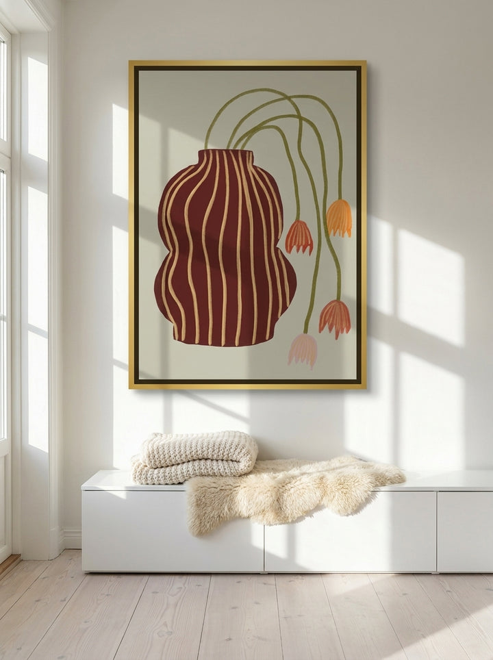 Oversized statement canvas wall art with a gold leaf surround styled on the wall in a bright Scandinavian living room