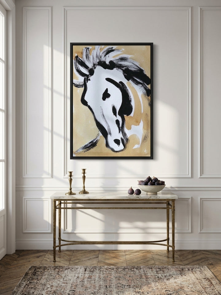 Canvas wall art with a black surround styled on the wall in a Parisian living room