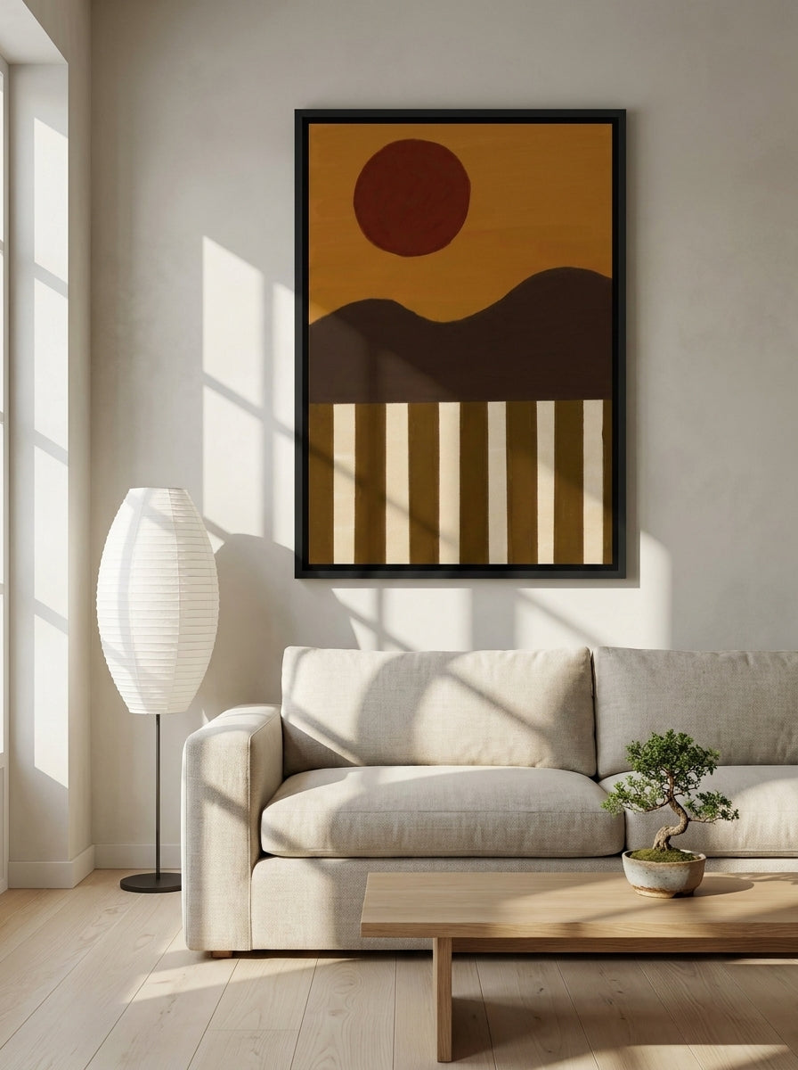 Canvas wall art with a black surround styled on the wall in a warm Japandi living room
