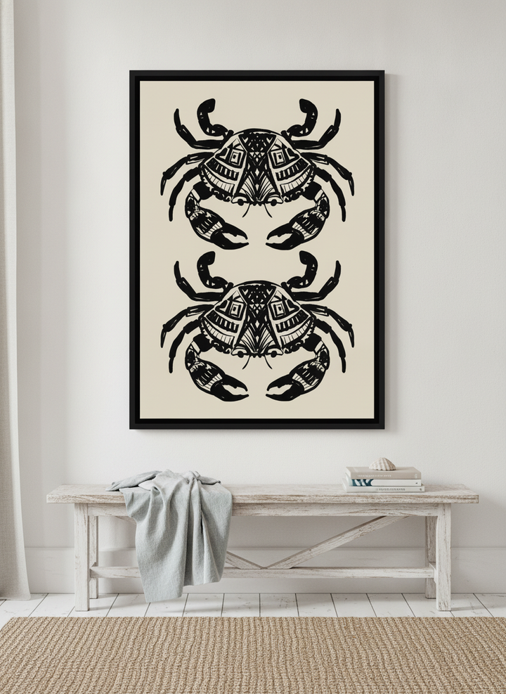 Canvas wall art with a black surround styled on the wall in a coastal living room