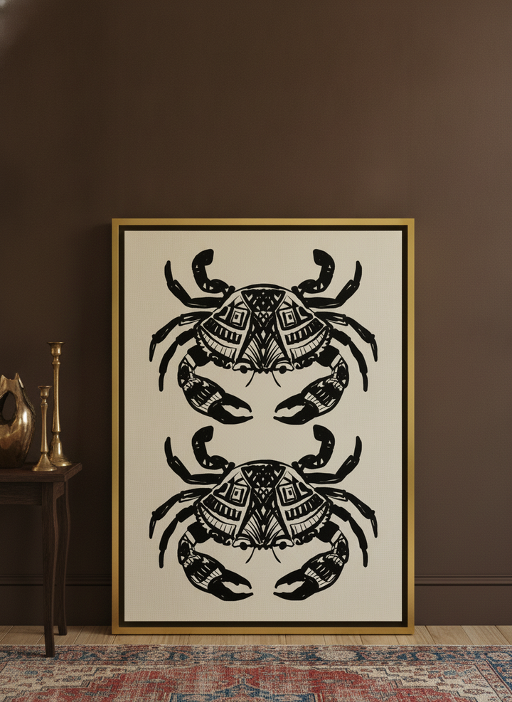 Canvas wall art with a gold leaf surround leaning against the wall in a moody kitchen