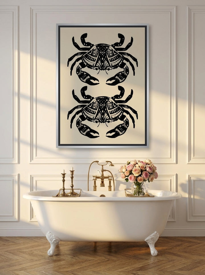 Canvas wall art with a silver leaf surround styled on the wall in a Parisian bathroom