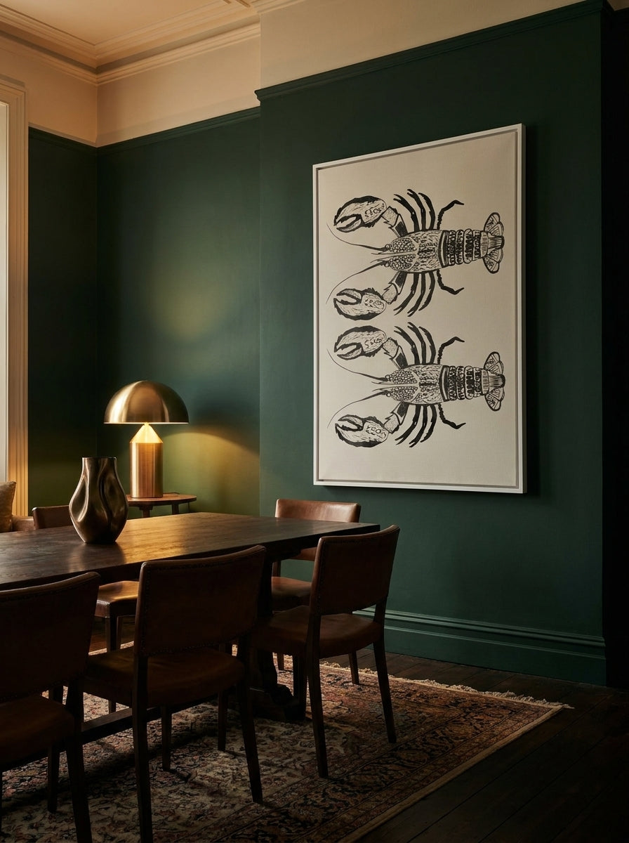 Oversized statement canvas wall art with a white surround styled on the wall in a moody dining room