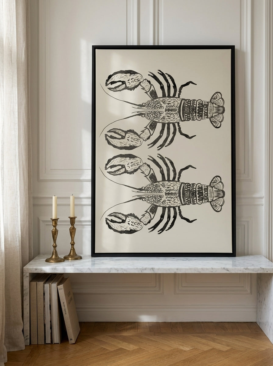 Canvas wall art with a black surround standing on a kitchen bench in a Parisian kitchen