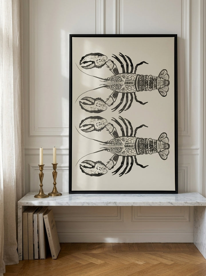 Canvas wall art with a black surround standing on a kitchen bench in a Parisian kitchen