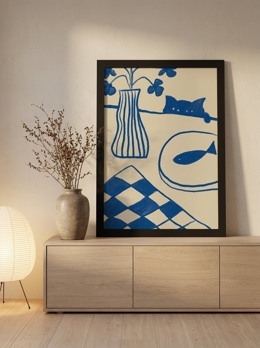 Modern wall art print standing on a sideboard in a warm Japandi bedroom