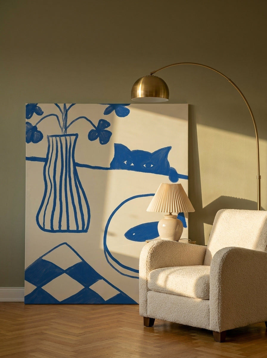 Stretched canvas wall art leaning against the wall in a mid-century dining room