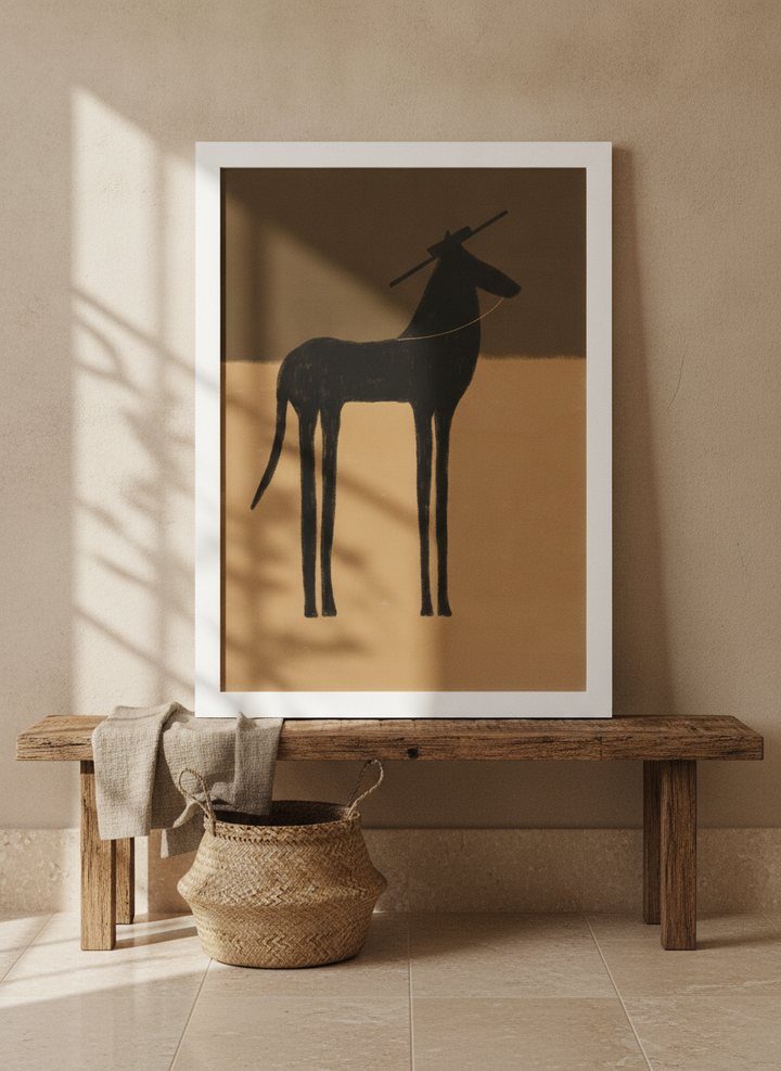 Modern wall art print standing on a bench in a Mediterranean bedroom