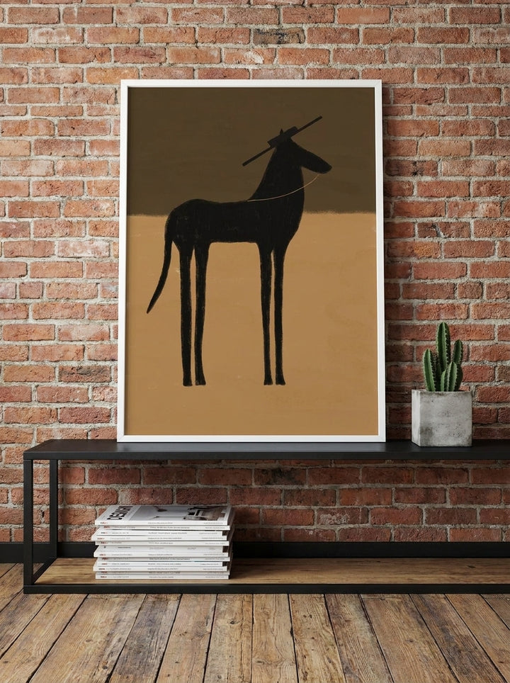 Modern wall art print standing on a console in an industrial loft home office