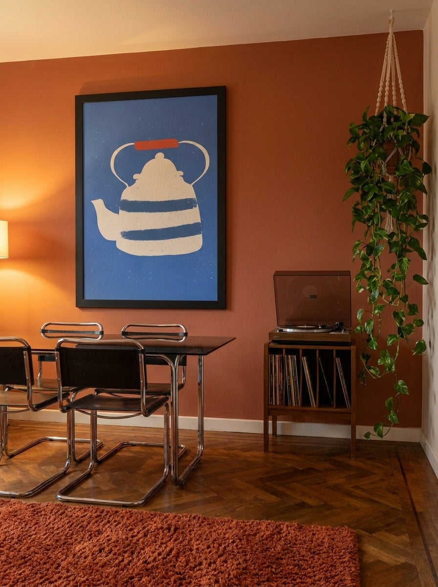 Oversized statement modern wall art print styled on the wall in a retro 70s dining room