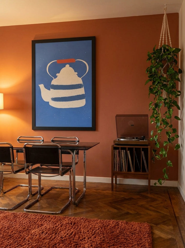 Oversized statement modern wall art print styled on the wall in a retro 70s dining room