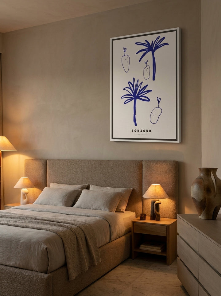 Canvas wall art with a white surround styled on the wall in a luxe bedroom
