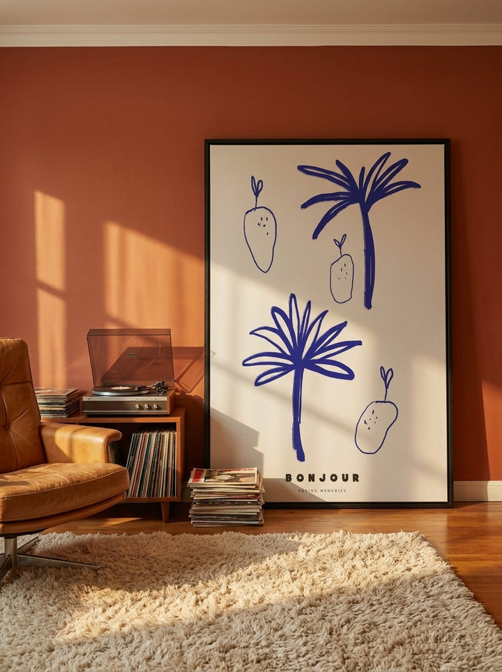 Oversized statement canvas wall art with a black surround leaning against the wall in a retro 70s living room