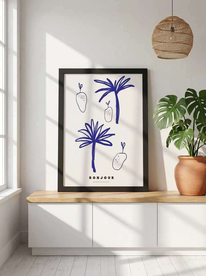 Modern wall art print standing on a kitchen bench in a bright Scandinavian kitchen