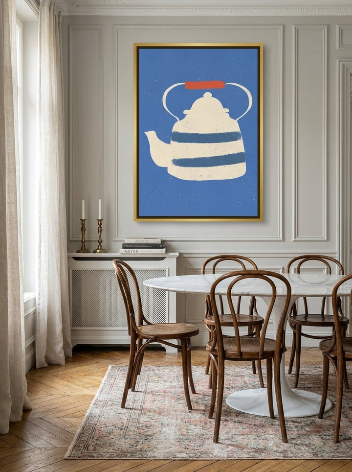 Oversized statement canvas wall art with a gold leaf surround styled on the wall in a Parisian dining room
