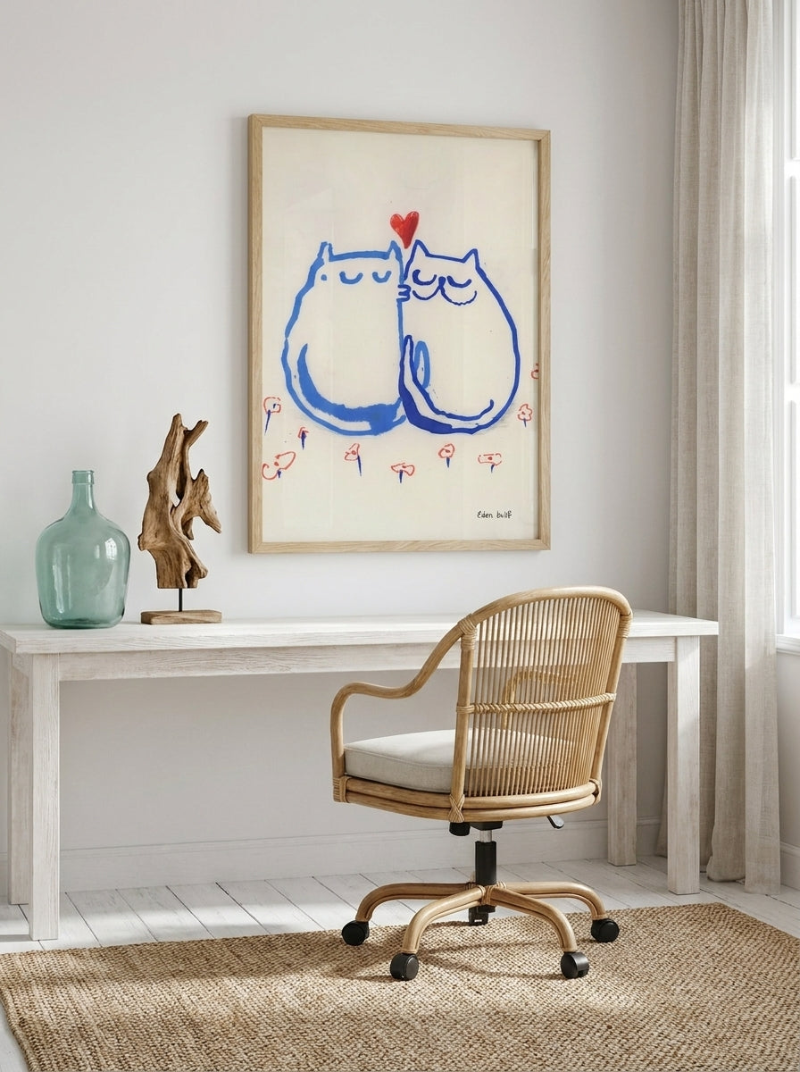 Modern wall art print styled on the wall in a coastal home office