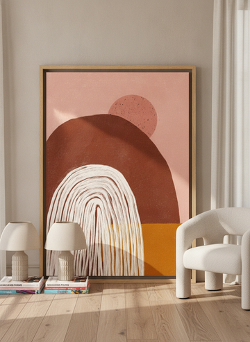 Oversized statement canvas wall art with a natural timber surround leaning against the wall in a luxe dining room
