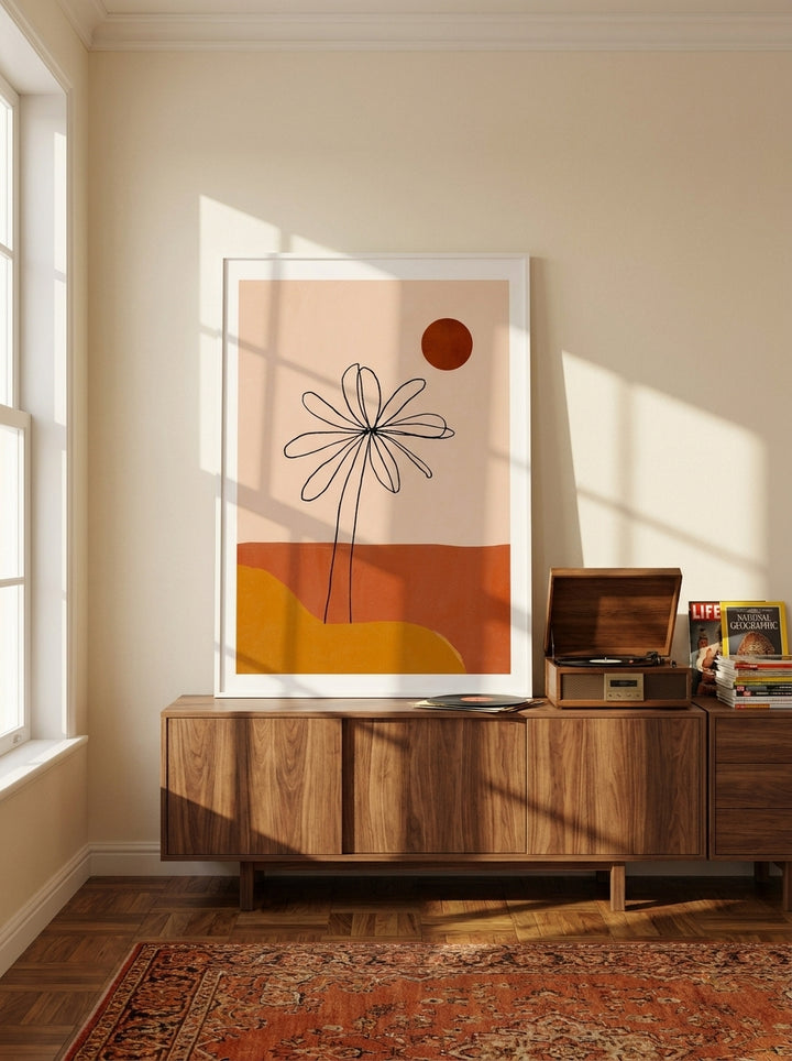 Modern wall art print standing on a sideboard in a retro 70s home office