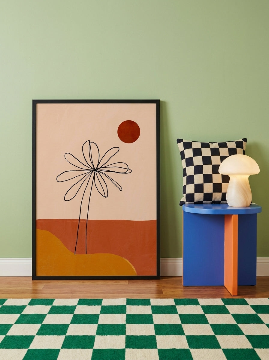 Modern wall art print leaning against the wall in a colourful eclectic living room