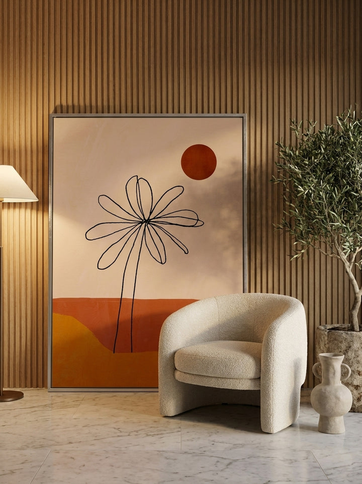 Oversized statement canvas wall art with a silver leaf surround leaning against the wall in a luxe bedroom