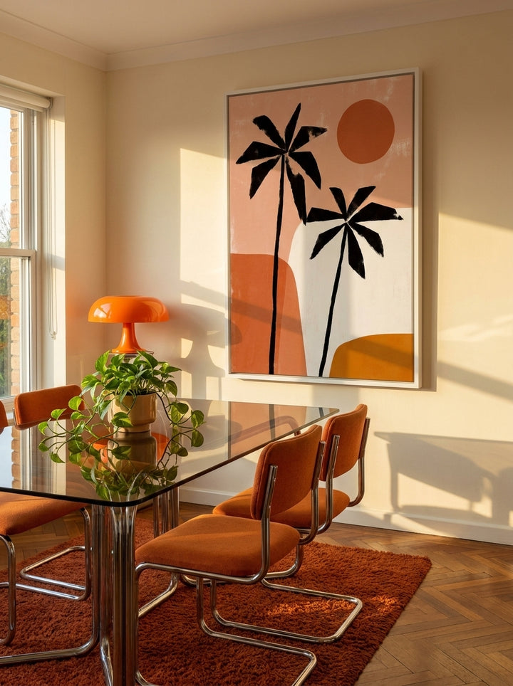 Oversized statement canvas wall art with a white surround styled on the wall in a retro 70s dining room