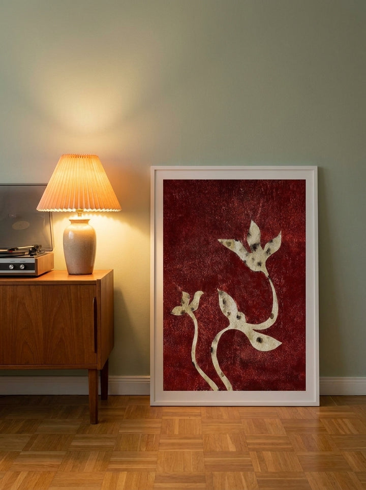 Modern wall art print leaning against the wall in a mid-century living room