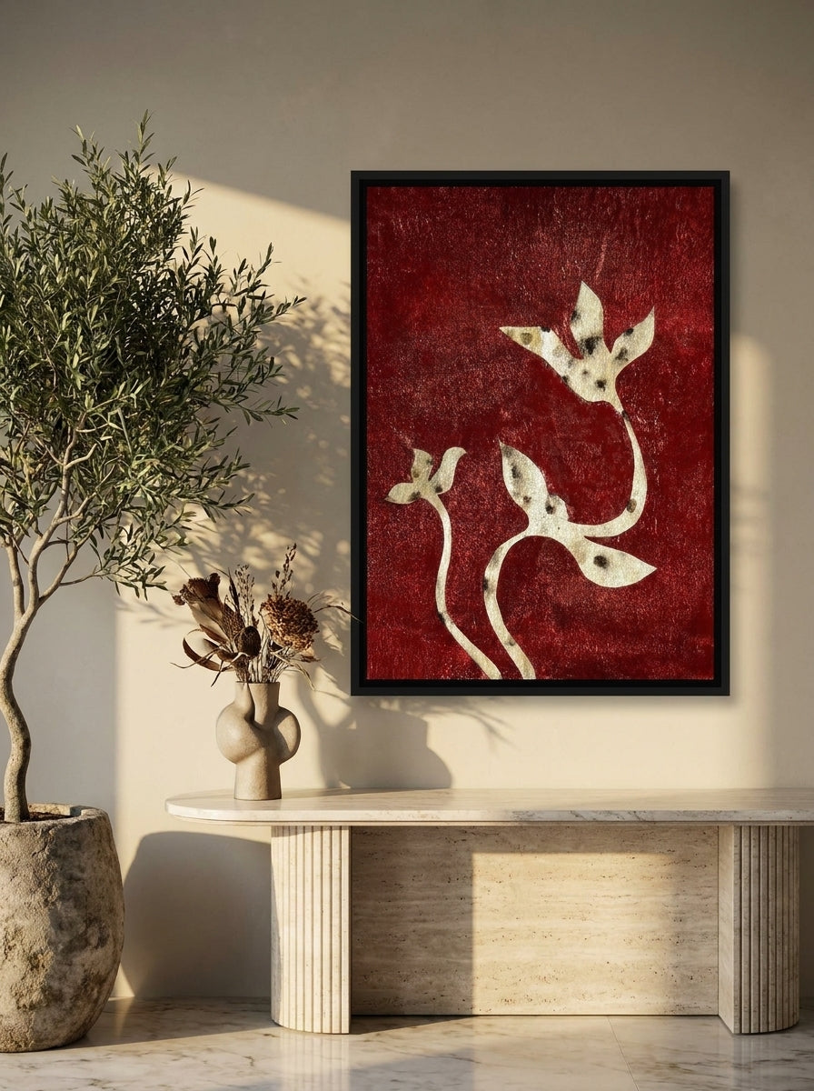 Canvas wall art with a black surround styled on the wall in a luxe living room