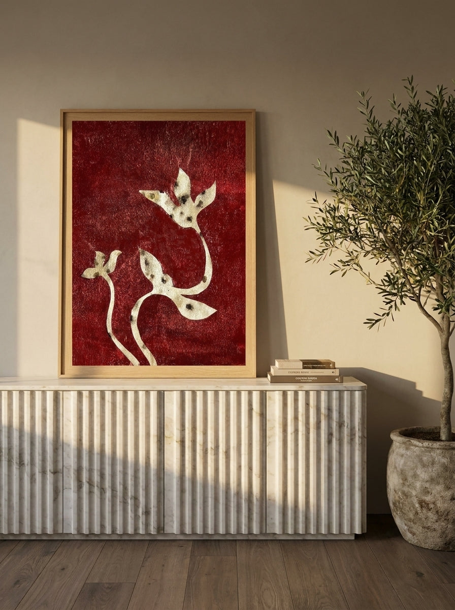 Modern wall art print standing on a sideboard in a luxe dining room