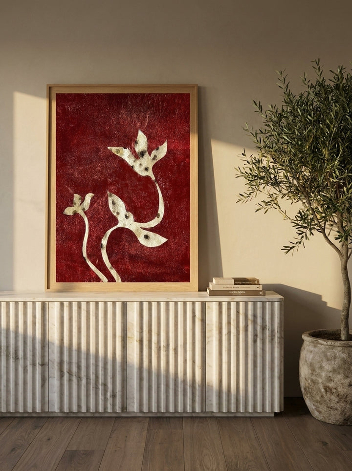 Modern wall art print standing on a sideboard in a luxe dining room