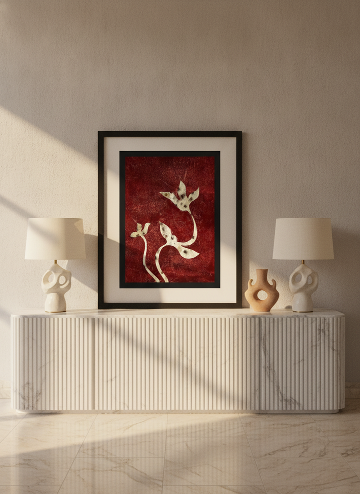 Modern wall art print standing on a sideboard in a luxe bedroom