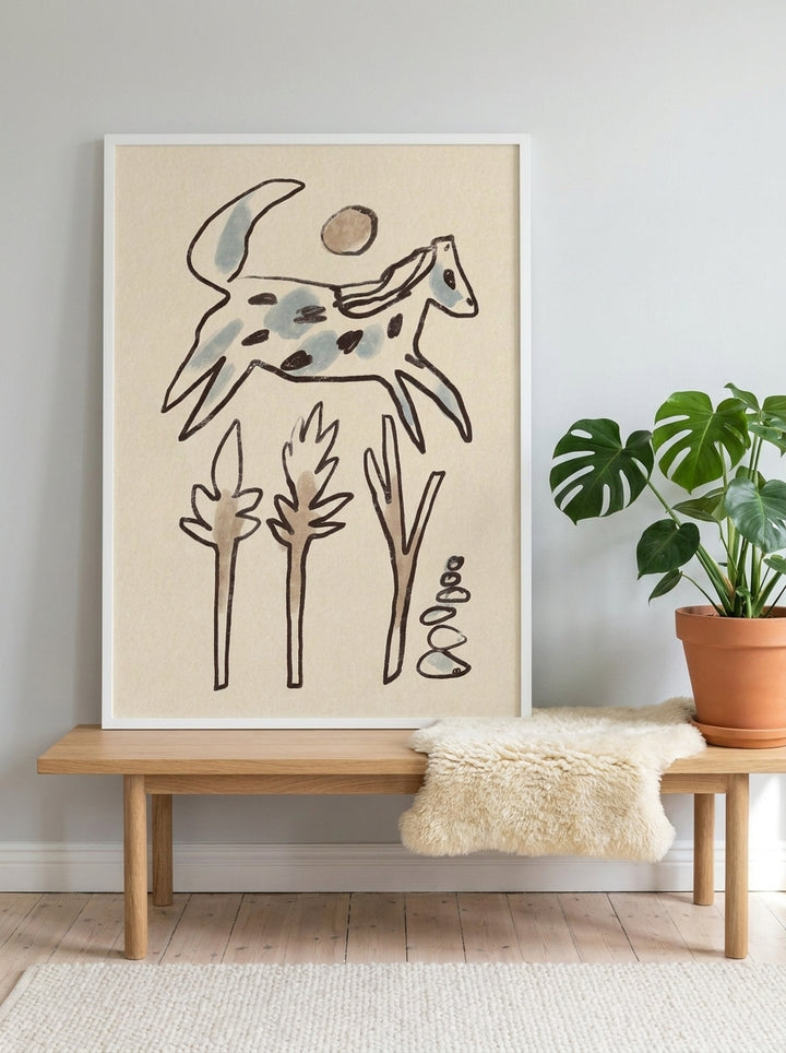 Modern wall art print standing on a bench in a bright Scandinavian bedroom