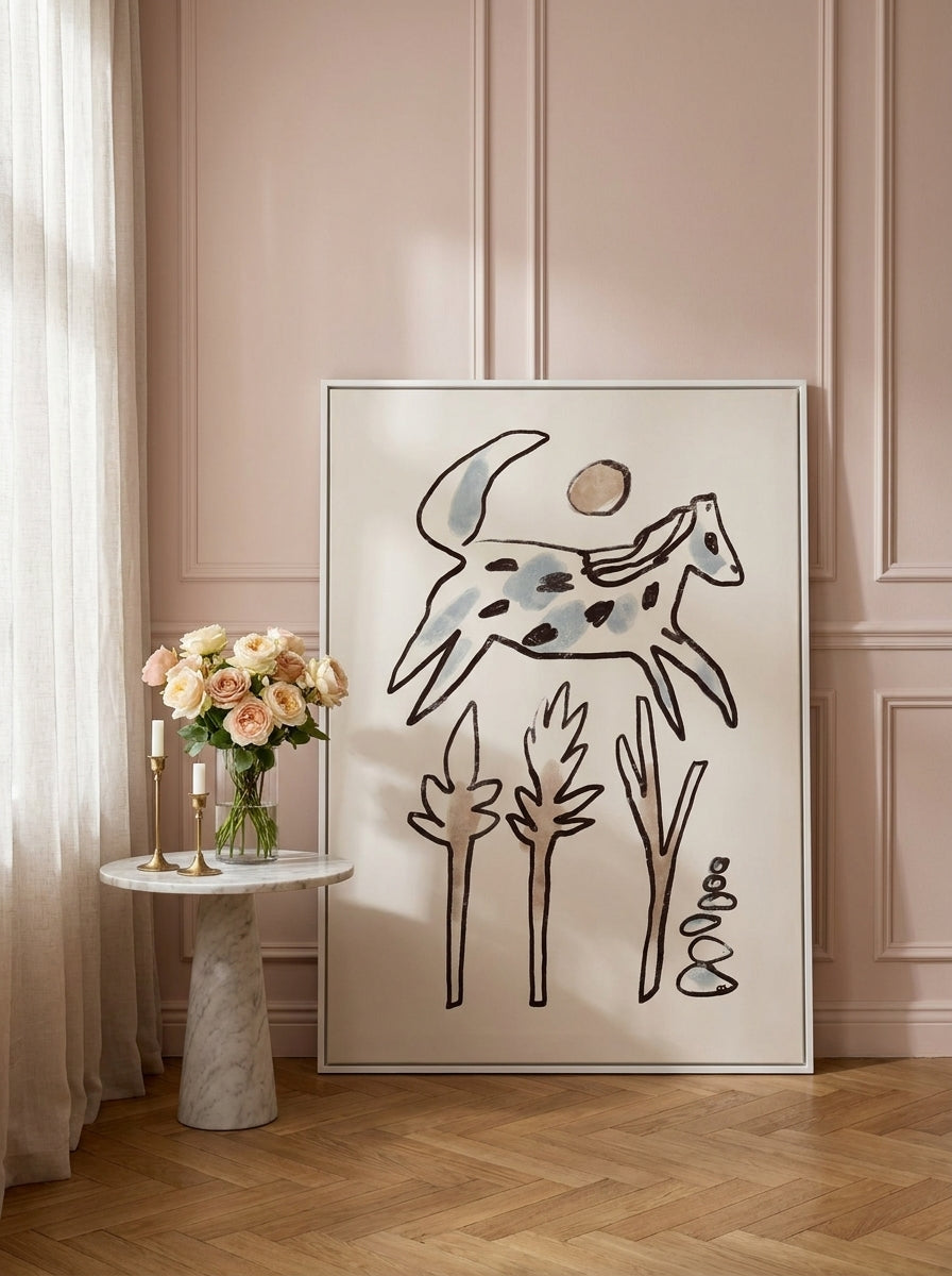 Canvas wall art with a white surround leaning against the wall in a Parisian kitchen