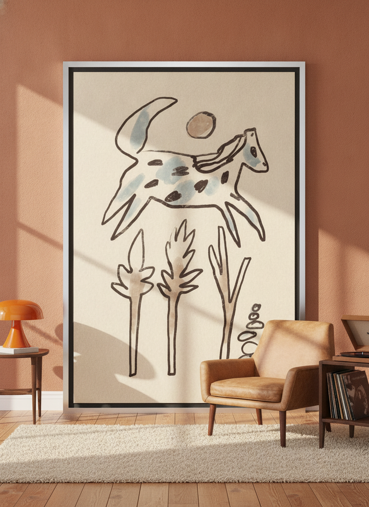 Oversized statement canvas wall art with a silver leaf surround leaning against the wall in a retro 70s living room