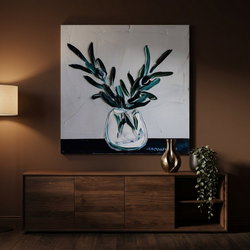 Stretched canvas wall art styled on the wall in a moody living room