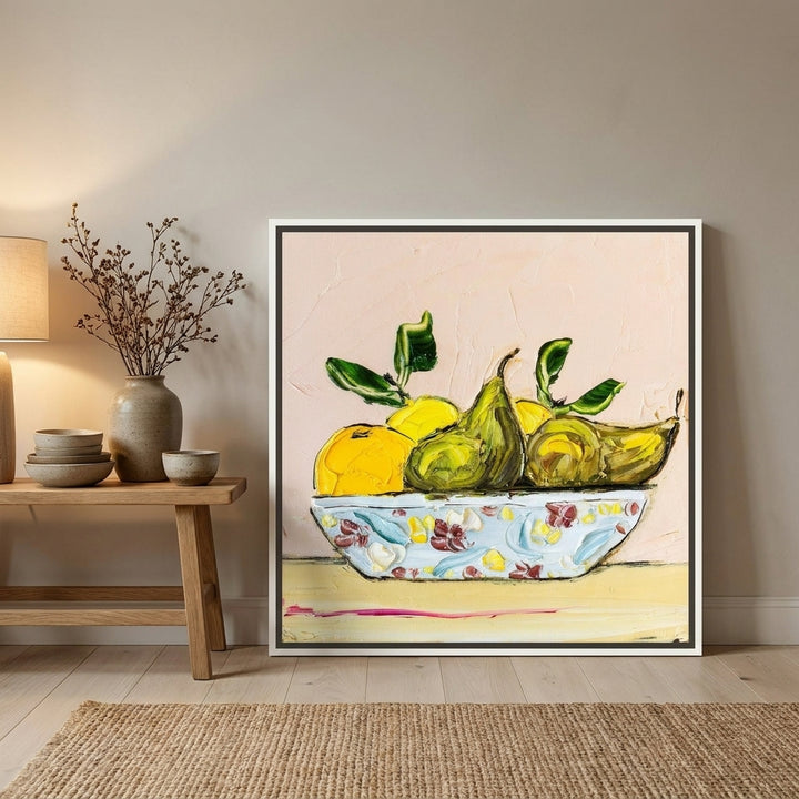 Canvas wall art with a white surround leaning against the wall in a warm Japandi kitchen