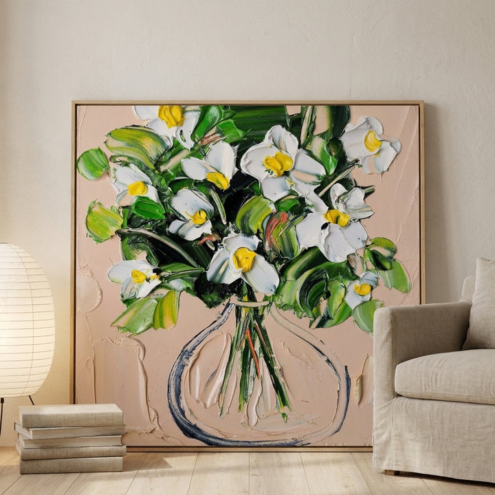 Oversized statement canvas wall art with a natural timber surround leaning against the wall in a warm Japandi living room