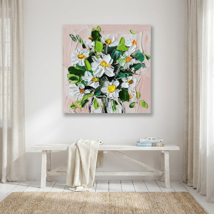 Stretched canvas wall art styled on the wall in a coastal living room
