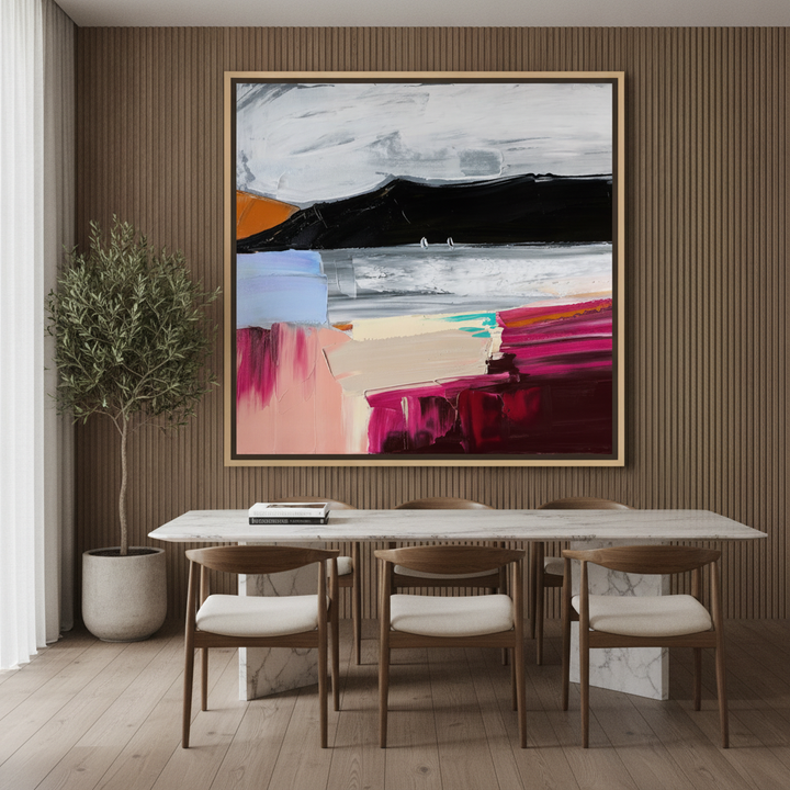 Oversized statement canvas wall art with a natural timber surround styled on the wall in a luxe dining room