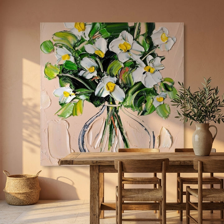 Stretched canvas wall art styled on the wall in a Mediterranean dining room