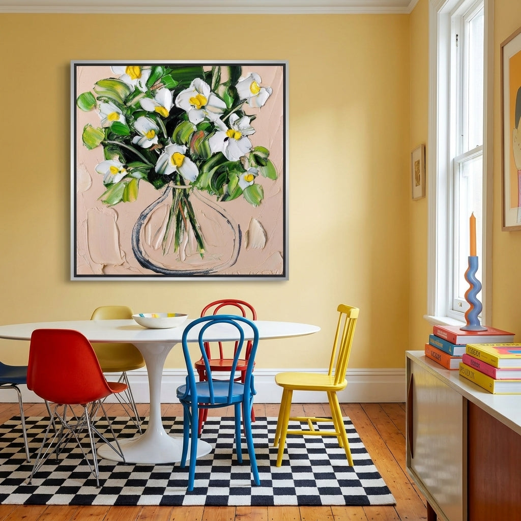 Oversized statement canvas wall art with a silver leaf surround styled on the wall in a colourful eclectic dining room