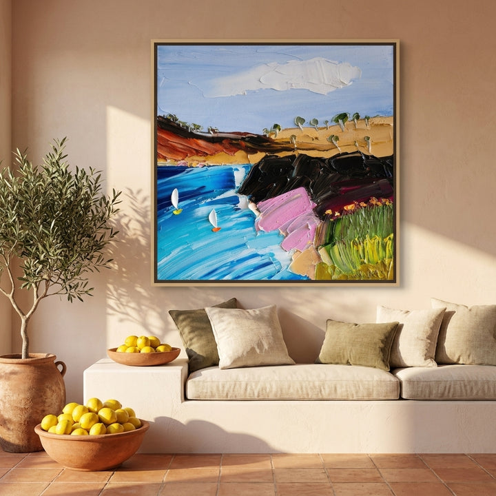 Oversized statement canvas wall art with a natural timber surround styled on the wall in a Mediterranean living room