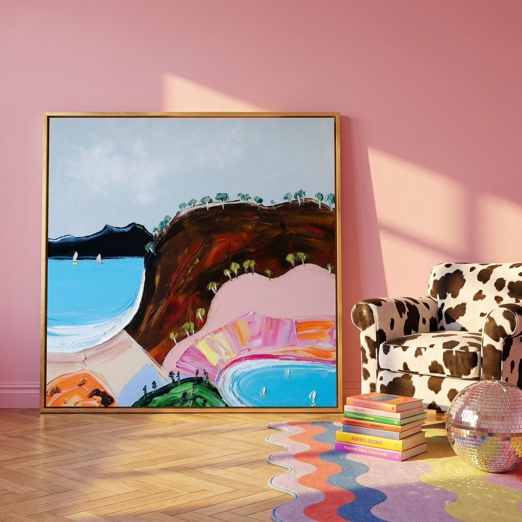 Oversized statement canvas wall art with a gold leaf surround leaning against the wall in a colourful eclectic living room