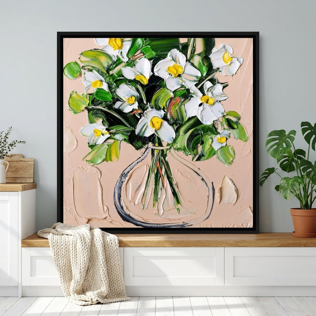 Canvas wall art with a black surround standing on a kitchen bench in a bright Scandinavian kitchen